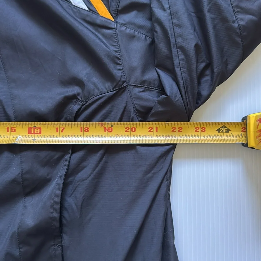 Vintage Adidas black, orange & white windbreaker jacket.  Men’s size small